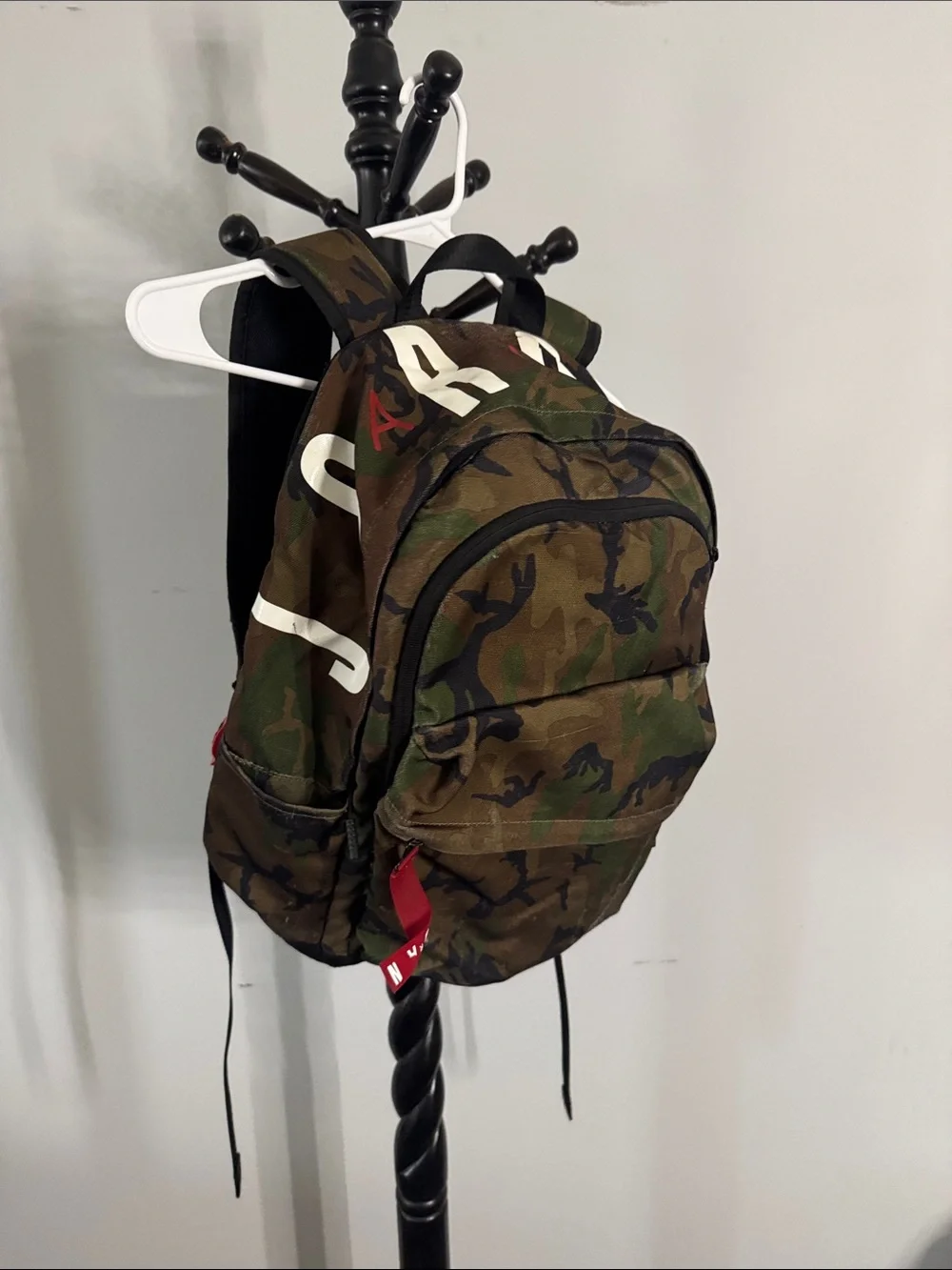 Camouflage Men's Backpack with Red Accent Pulls